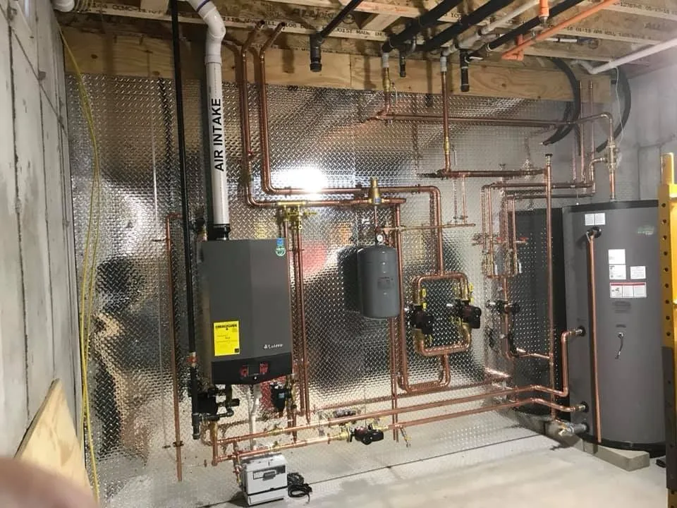 Finished boiler room with copper piping by RPM